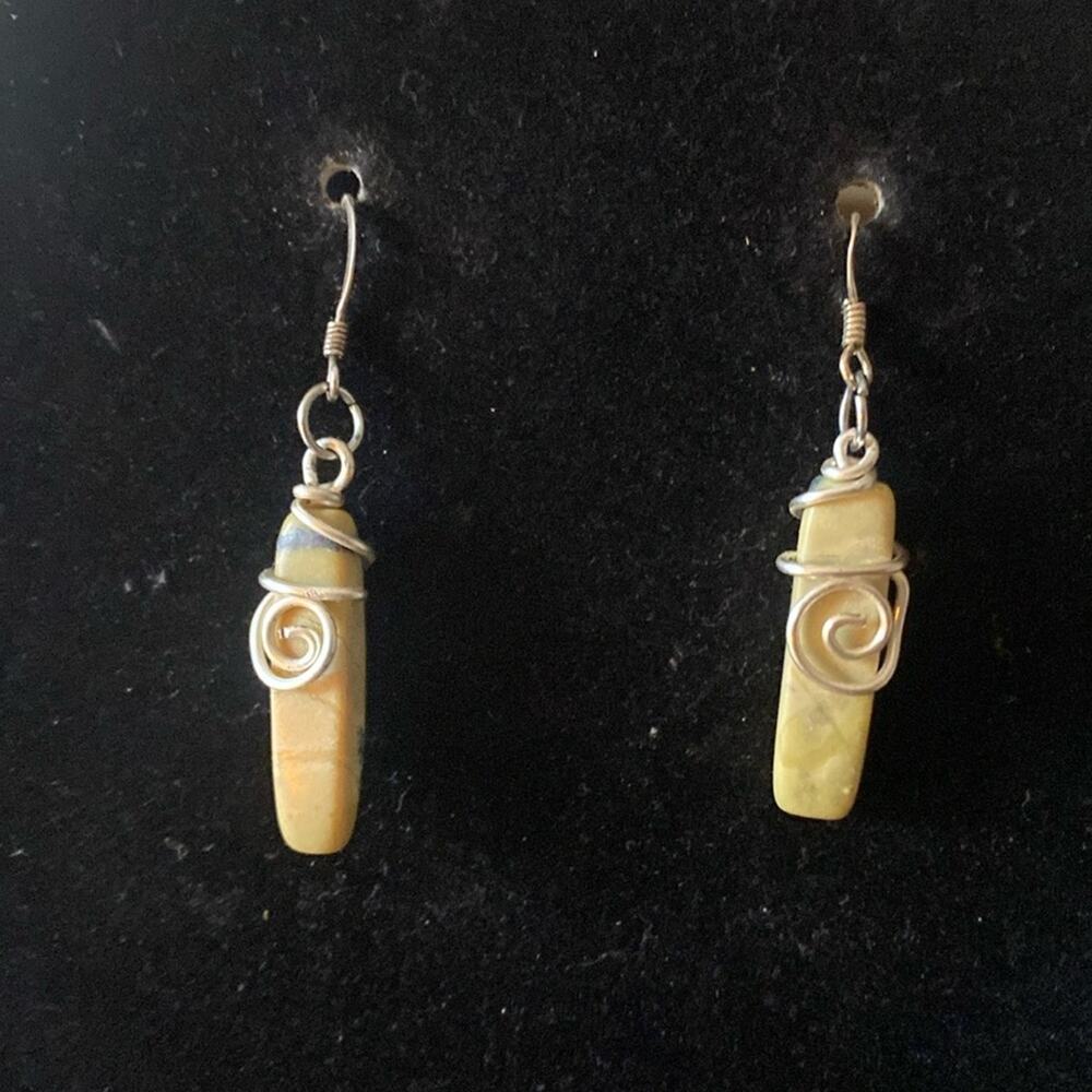 Handmade green stone earrings with silver swirly detailing